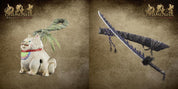 A split-screen display showing two items from the game Onimusha: Way of the Sword. On the left, a white ceramic Onimusha dog figurine with a green leaf collar and red collar is shown.