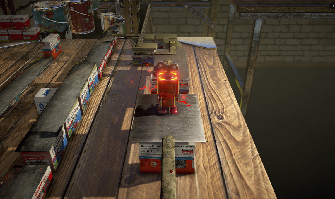 Red glowing object on a wooden platform with boxes and barrels in the background