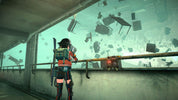 A video game scene showing a female character in a futuristic red and black outfit standing on a concrete walkway, looking out over a large broken green-tinted glass wall with debris floating outside.
