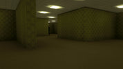 A dark, empty room with dim overhead lights, patterned wallpaper, and a small dark figure standing in the distance.
