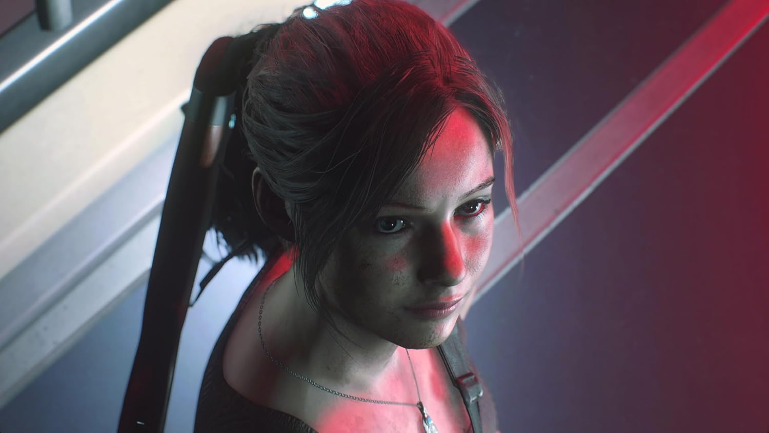 Character with red face paint and black hair in a ponytail, wearing a red outfit.