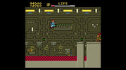 Screenshot of a retro-style video game with a character in a maze-like environment.