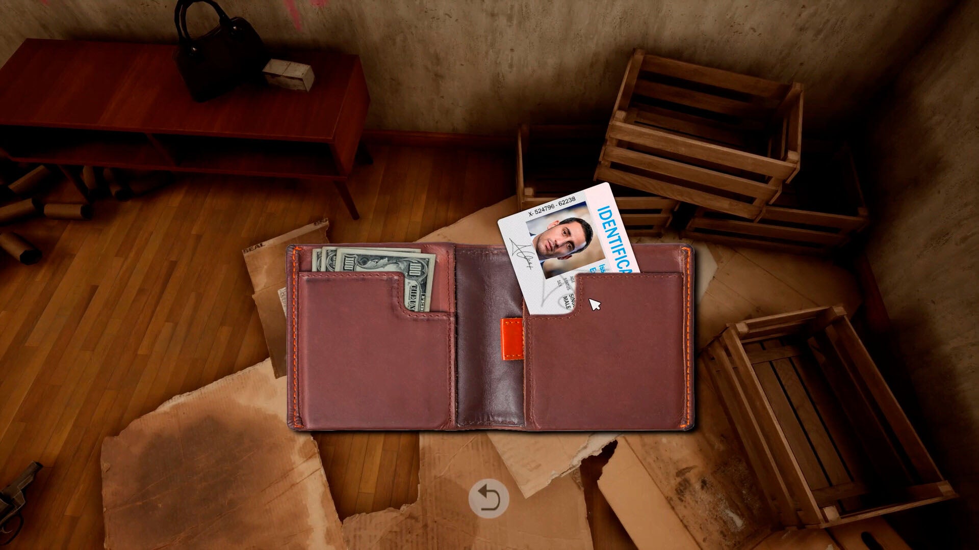 Brown leather wallet with money and card on a wooden floor with cardboard boxes