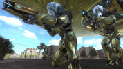 Three gold and silver sci-fi mecha robots in a city street under a large golden structure, with buildings and blue sky in the background.