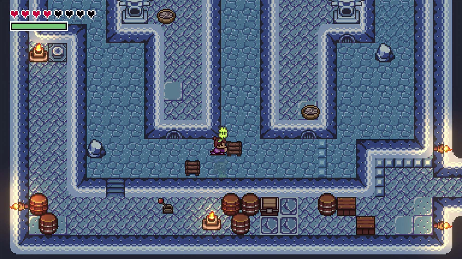 Pixel art top-down scene showing a small character standing in a blue stone corridor with barrels, crates, and interface elements along the top, resembling a video game map screenshot.