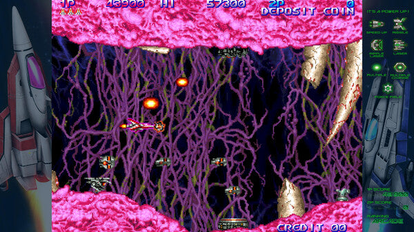 Screenshot of a retro-style space shooter game with vibrant colors and on-screen text.