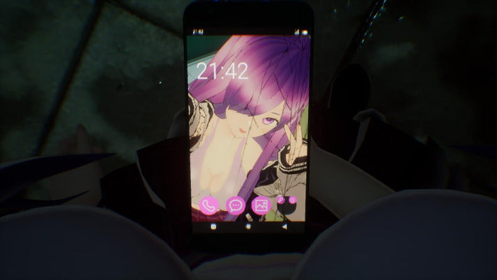 A black smartphone held in a dark environment, displaying a pink anime wallpaper with a purple-haired character. The phone is centered, with blurred dark shapes in the foreground and background.