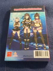 A boxed collectible figure set photographed from above on a dark blue textured fabric surface. The front of the box features anime-style female characters against a blue underwater scene, with visible publisher marks including Quatro Sogei and Playasia.