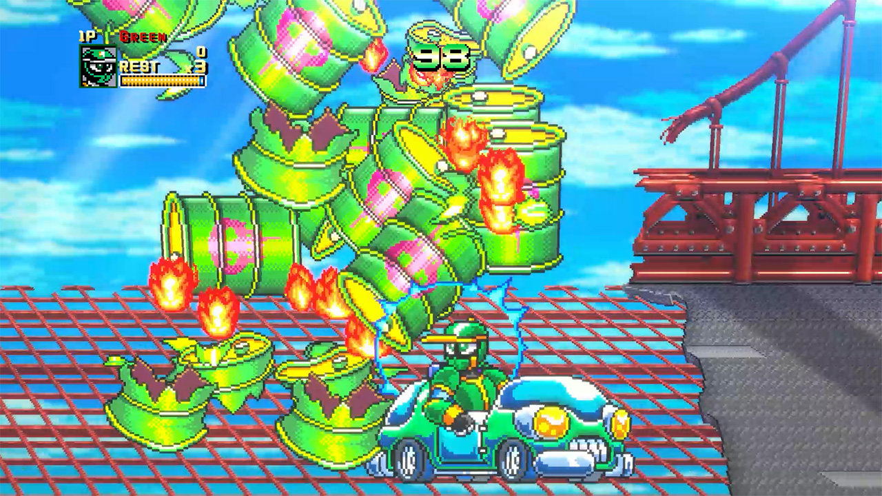 A colorful pixel-art scene showing a green character in a blue race car on a bridge-like platform, facing a giant stack of green barrels with pink and yellow accents. The background is a bright blue sky, and the scene has a retro video game HUD in the top left.
