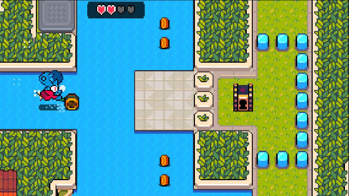 Top-down view of a platformer game with a character, enemies, and power-ups on a grid.