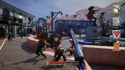 Video game scene with a character holding a gun in a colorful, festive town square.