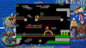 Video game screen with character and platforms, surrounded by colorful game world elements.