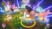 A colorful video game scene showing a lion-like character fighting a dinosaur-like creature in a neon-lit forest arena, with UI elements and scoreboards visible around the edges.