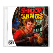 A CD case for the video game Shadow Gangs, featuring illustrated cover art with a man holding a rifle in front of a city street scene, plus the Wave VGNY Soft and Juxtapor logos.