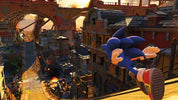 Sonic the Hedgehog running through a detailed, warm-toned sci-fi city environment at sunset, with buildings, bridges, and action-packed scenery.