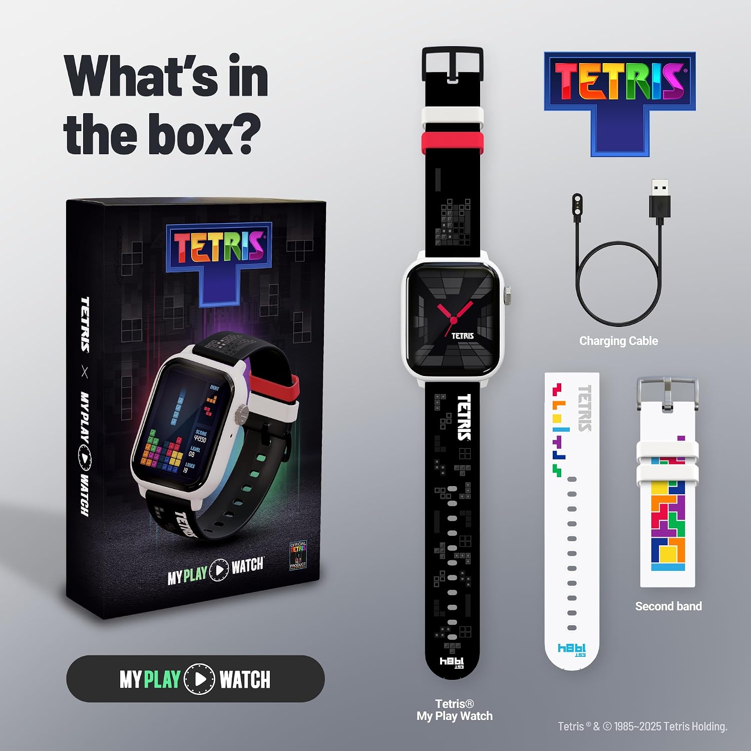 Tetris-themed smartwatch with packaging, charging cable, and additional band on a gray background