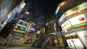 Stylized urban scene with colorful buildings and signs at night.