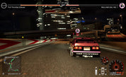 Car racing game scene with a car on a city street at night.