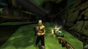 Character in a video game with a weapon and glowing object in a cave-like environment