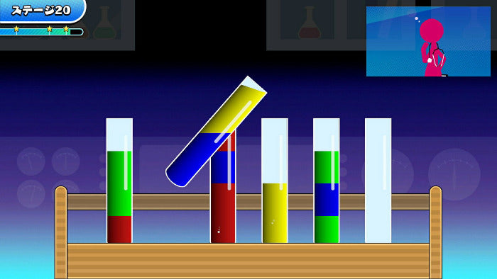 A colorful digital game or animation scene showing a wooden stand with several test tubes containing green, red, yellow, and blue liquids, plus a small inset screen with a pink stick figure.