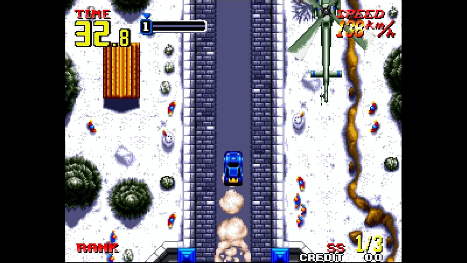 Screenshot of a racing game with a car on a track, surrounded by obstacles and graphics.